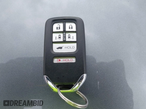 2014 Honda Odyssey Touring with VIN 5FNRL5H9XEB073156, listed as a IAAI auction lot 41990714 with 166,129 mi miles and . Bid and sale history available at DreamBid. Image 11.