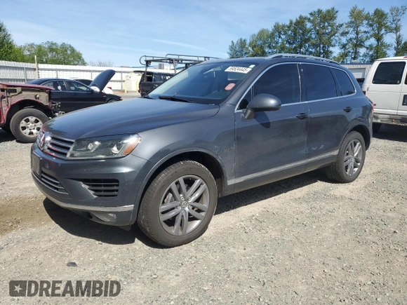 2015 Volkswagen Touareg Lux с VIN WVGEP9BP0FD006992, выставлен на аукционе Copart как лот 59524445 с пробегом 169 822 миль миль и Списание • Salvage title. История ставок и продаж доступна на DreamBid. Изображение 1.