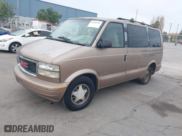 1996 GMC Safari z VIN 1GKDM19W3TB533427, wystawiony jako IAAI lot #38894124 z przebiegiem 261 801 mil mil oraz . Historia ofert i sprzedaży dostępna na DreamBid. Obrazek 2.