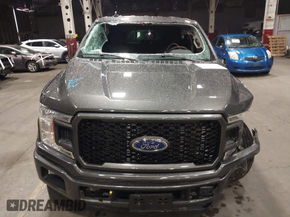 2020 Ford F-150 XL with VIN 1FTEX1CP1LKE40401, listed as a IAAI auction lot 41306900 with 26,087 mi miles and . Bid and sale history available at DreamBid. Image 14.