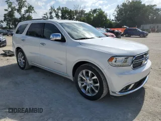2018 Dodge Durango Citadel with VIN 1C4RDHEG4JC115118, listed as a Copart auction lot 60633055 with 77,665 mi miles and Salvage title. Bid and sale history available at DreamBid. Image 4.