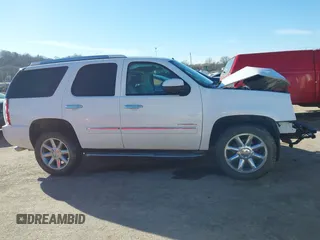 2014 GMC Yukon Denali with VIN 1GKS2EEF2ER111301, listed as a IAAI auction lot 41636112 with 185,956 mi miles. Bid and sale history available at carsss.com. Image 13.