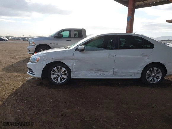 2016 Volkswagen Jetta Sedan 1.4T SE w/Connectivity with VIN 3VWD67AJ9GM360727, listed as a IAAI auction lot 41430367 with 124,993 mi miles. Bid and sale history available at carsss.com. Image 6.