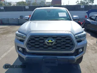 2020 Toyota Tacoma SR5 with VIN 3TMAZ5CN7LM138859, listed as a IAAI auction lot 42150725 with 36,462 mi miles and . Bid and sale history available at DreamBid. Image 6.