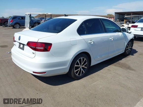 2017 Volkswagen Jetta SE with VIN 3VWDB7AJ7HM209222, listed as a IAAI auction lot 42655859 with 127,468 mi miles and . Bid and sale history available at DreamBid. Image 4.