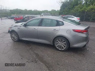 2016 Kia Optima SXL Turbo z VIN 5XXGV4L24GG085759, wystawiony jako IAAI lot #42179979 z przebiegiem 105 318 mil mil oraz . Historia ofert i sprzedaży dostępna na DreamBid. Obrazek 3.