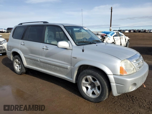 2004 Suzuki XL7 LX z VIN JS3TX92V944100393, wystawiony jako Copart lot #47747495 z przebiegiem 271 000 mil mil oraz Tytuł czysty. Historia ofert i sprzedaży dostępna na DreamBid. Obrazek 4.