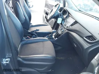 2019 Buick Encore Sport Touring with VIN KL4CJ1SB3KB962065, listed as a IAAI auction lot 41206207 with 59,618 mi miles. Bid and sale history available at carsss.com. Image 5.