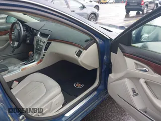 2009 Cadillac CTS AWD w/1SB with VIN 1G6DT57V190120218, listed as a IAAI auction lot 42105030 with 214,031 mi miles. Bid and sale history available at carsss.com. Image 5.