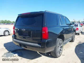 2015 Chevrolet Tahoe LT with VIN 1GNSCBKC2FR704344, listed as a IAAI auction lot 42087836 with 163,301 mi miles. Bid and sale history available at carsss.com. Image 4.