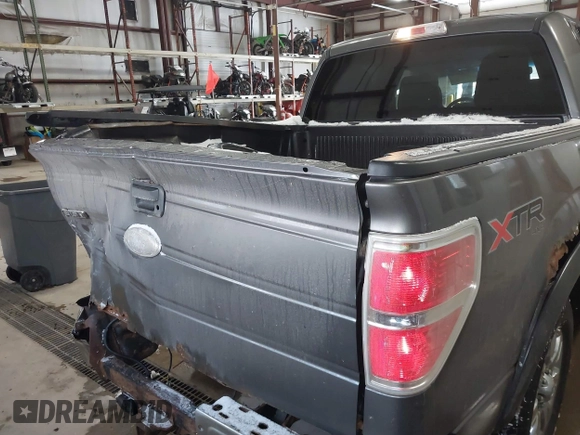 2011 Ford F-150 XLT with VIN 1FTFW1ET4BFB50467, listed as a IAAI auction lot 41608114 with 201,858 mi miles. Bid and sale history available at carsss.com. Image 16.