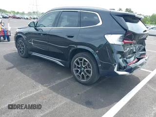 2023 BMW X1 xDrive28i with VIN WBX73EF03P5W15295, listed as a IAAI auction lot 42071192 with 23,326 mi miles and . Bid and sale history available at DreamBid. Image 3.