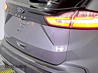 2021 Ford Edge Titanium z VIN 2FMPK3K92MBA53689, wystawiony jako IAAI lot #42501151 z przebiegiem 93 941 mil mil oraz . Historia ofert i sprzedaży dostępna na DreamBid. Obrazek 25.