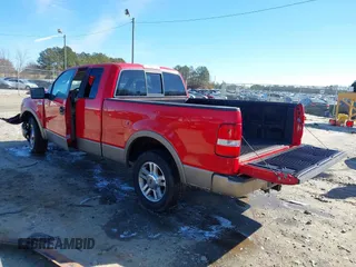 2005 Ford F-150 XLT with VIN 1FTPX12555NB76674, listed as a IAAI auction lot 41371363 with 137,782 mi miles. Bid and sale history available at carsss.com. Image 3.