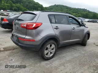 2012 Kia Sportage LX z VIN KNDPB3A20C7217165, wystawiony jako Copart lot #60999525 z przebiegiem 128 231 mil mil oraz Szkoda całkowita • Salvage title. Historia ofert i sprzedaży dostępna na DreamBid. Obrazek 3.