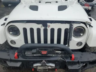 2015 Jeep Wrangler Unlimited Rubicon Hard Rock with VIN 1C4HJWFG8FL647910, listed as a Copart auction lot 46716605 with 48,139 mi miles and Salvage Title. Bid and sale history available at carsss.com. Image 11.
