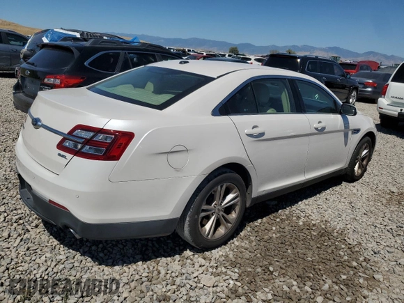 2015 Ford Taurus SEL z VIN 1FAHP2E8XFG181929, wystawiony jako Copart lot #64022325 z przebiegiem 106 272 mil mil oraz Szkoda całkowita • Salvage title. Historia ofert i sprzedaży dostępna na DreamBid. Obrazek 3.