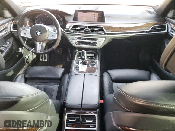 2020 BMW 7 Series z VIN WBA7W4C07LCD18314, wystawiony jako Copart lot #43724774 z przebiegiem 25 873 mil mil oraz . Historia ofert i sprzedaży dostępna na DreamBid. Obrazek 8.