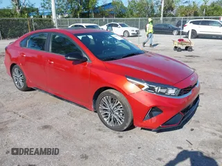 2023 Kia Forte GT-Line z VIN 3KPF54AD2PE567445, wystawiony jako IAAI lot #42030576 z przebiegiem 50 676 mil mil oraz . Historia ofert i sprzedaży dostępna na DreamBid. Obrazek 1.