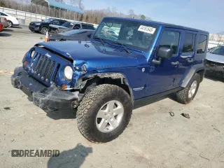 2009 Jeep Wrangler Unlimited Rubicon with VIN 1J4GA69179L763259, listed as a Copart auction lot 44161645 with 153,146 mi miles and Salvage title. Bid and sale history available at DreamBid. Image 1.