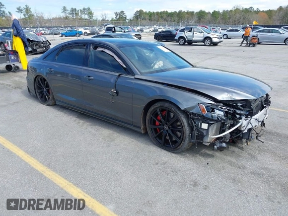 2022 Audi S8 with VIN WAULSAF83NN001905, listed as a IAAI auction lot 41813861 with 18,461 mi miles and . Bid and sale history available at DreamBid. Image 1.