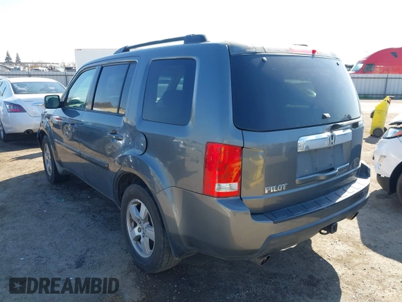 2009 Honda Pilot EX with VIN 5FNYF48439B036957, listed as a IAAI auction lot 41656284 with 199,115 mi miles. Bid and sale history available at carsss.com. Image 3.