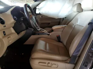 2012 Honda Pilot EX-L with VIN 5FNYF3H59CB032843, listed as a Copart auction lot 51201795 with 129,714 mi miles and Salvage Title. Bid and sale history available at DreamBid. Image 7.