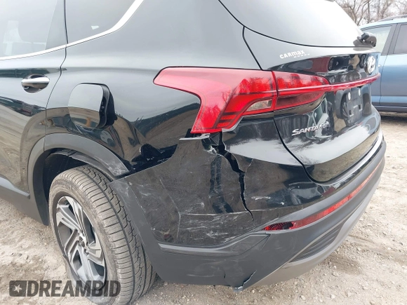 2023 Hyundai Santa Fe SEL with VIN 5NMS24AJ9PH533928, listed as a IAAI auction lot 41784157 with 56,903 mi miles and . Bid and sale history available at DreamBid. Image 6.