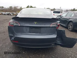 2022 Tesla Model 3 with VIN 5YJ3E1EA6NF143839, listed as a IAAI auction lot 40905007 with 83,897 mi miles and . Bid and sale history available at DreamBid. Image 15.