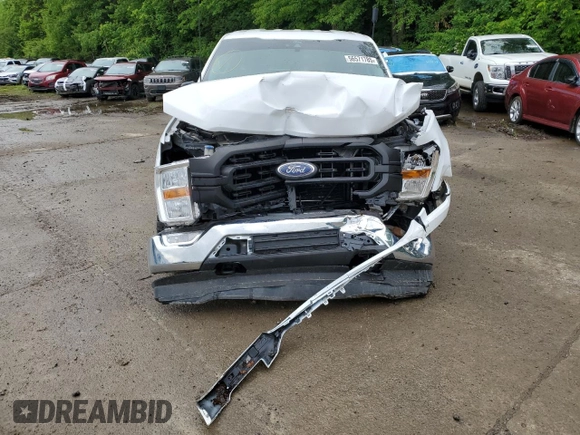 2021 Ford F-150 XL with VIN 1FTFX1E51MFC05216, listed as a Copart auction lot 56571785 with 94,584 mi miles and Salvage title. Bid and sale history available at DreamBid. Image 5.