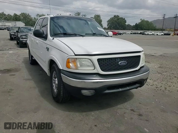 2002 Ford F-150 XLT with VIN 1FTRW07L52KA04929, listed as a Copart auction lot 54491815 with 169,132 mi miles and Salvage Title. Bid and sale history available at carsss.com. Image 13.