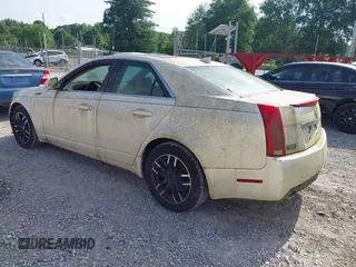 2009 Cadillac CTS RWD with VIN 1G6DF577690108865, listed as a IAAI auction lot 42314121 with 153,702 mi miles and . Bid and sale history available at DreamBid. Image 3.