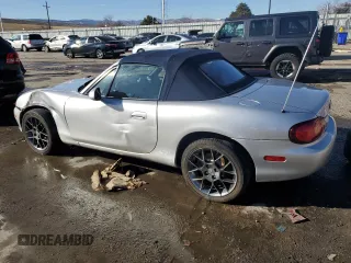 2004 Mazda MX-5 Miata LS with VIN JM1NB353640402308, listed as a Copart auction lot 84568244 with 50,287 mi miles and Salvage title. Bid and sale history available at DreamBid. Image 2.