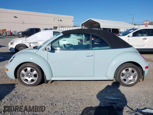 2003 Volkswagen Beetle GLS z VIN 3VWCK21YX3M304572, wystawiony jako IAAI lot #41286079 z przebiegiem 42 450 mil mil oraz . Historia ofert i sprzedaży dostępna na DreamBid. Obrazek 14.