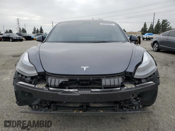 2023 Tesla Model 3 with VIN 5YJ3E1EA4PF642769, listed as a Copart auction lot 50648825 with 25,310 mi miles and Salvage title. Bid and sale history available at DreamBid. Image 5.