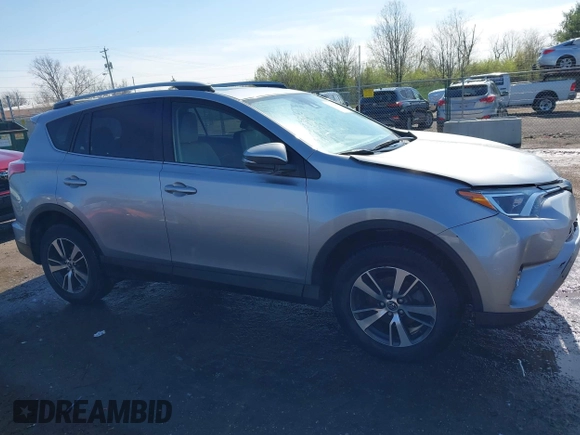 2018 Toyota RAV4 XLE with VIN JTMWFREV3JD120189, listed as a IAAI auction lot 41976999 with 62,182 mi miles and . Bid and sale history available at carsss.com. Image 14.