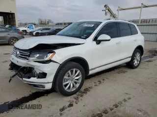 2016 Volkswagen Touareg Sport с VIN WVGEF9BP9GD005988, выставлен на аукционе Copart как лот 87360354 с пробегом 93 435 миль миль и Списание • Salvage title. История ставок и продаж доступна на DreamBid. Изображение 1.