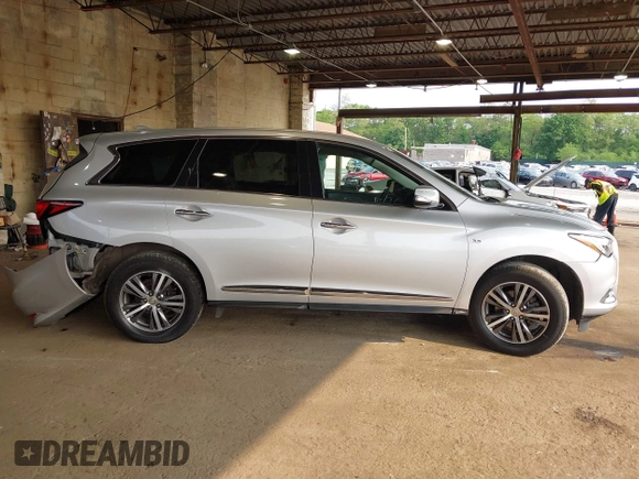 2020 Infiniti QX60 Luxe with VIN 5N1DL0MN4LC531229, listed as a IAAI auction lot 42389359 with 106,545 mi miles and . Bid and sale history available at DreamBid. Image 13.