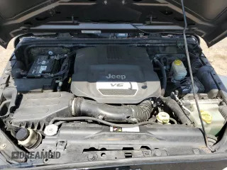 2014 Jeep Wrangler Unlimited Sport with VIN 1C4BJWDG1EL298161, listed as a Copart auction lot 61996735 with 176,043 mi miles and Salvage title. Bid and sale history available at DreamBid. Image 12.