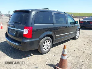 2016 Chrysler Town & Country Touring with VIN 2C4RC1BG5GR230356, listed as a IAAI auction lot 41993002 with 153,821 mi miles. Bid and sale history available at carsss.com. Image 4.