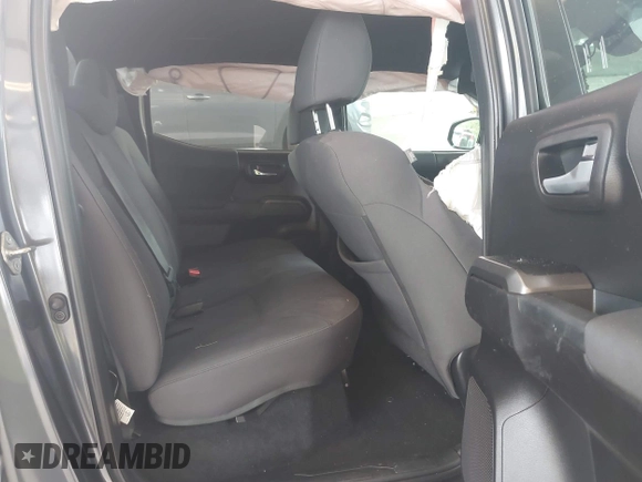 2019 Toyota Tacoma SR z VIN 3TMCZ5AN1KM257081, wystawiony jako IAAI lot #42211385 z przebiegiem 60 229 mil mil oraz . Historia ofert i sprzedaży dostępna na DreamBid. Obrazek 8.