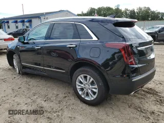 2023 Cadillac XT5 FWD Luxury z VIN 1GYKNAR40PZ106096, wystawiony jako Copart lot #80909074 z przebiegiem 19 677 mil mil oraz Nie do naprawy • Non repairable. Historia ofert i sprzedaży dostępna na DreamBid. Obrazek 2.