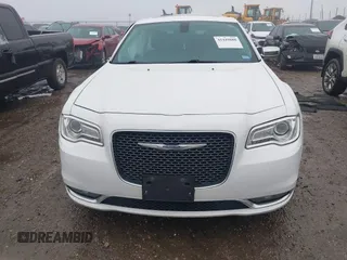 2016 Chrysler 300 with VIN 2C3CCAEG4GH319881, listed as a IAAI auction lot 41449888 with 124,740 mi miles. Bid and sale history available at carsss.com. Image 12.