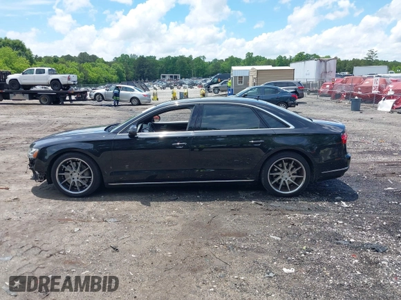 2015 Audi A8 3.0T with VIN WAU3GAFD6FN008993, listed as a IAAI auction lot 42239421 with 125,587 mi miles and . Bid and sale history available at DreamBid. Image 14.