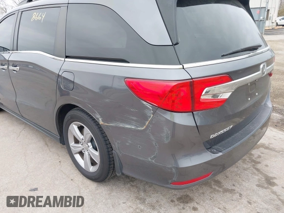 2018 Honda Odyssey EX-L with VIN 5FNRL6H72JB076597, listed as a IAAI auction lot 41838664 with 154,647 mi miles and . Bid and sale history available at DreamBid. Image 6.