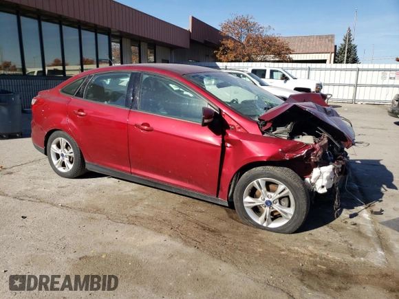 2014 Ford Focus SE with VIN 1FADP3F20EL340123, listed as a Copart auction lot 77626984 with 69,487 mi miles and Salvage Title. Bid and sale history available at DreamBid. Image 4.