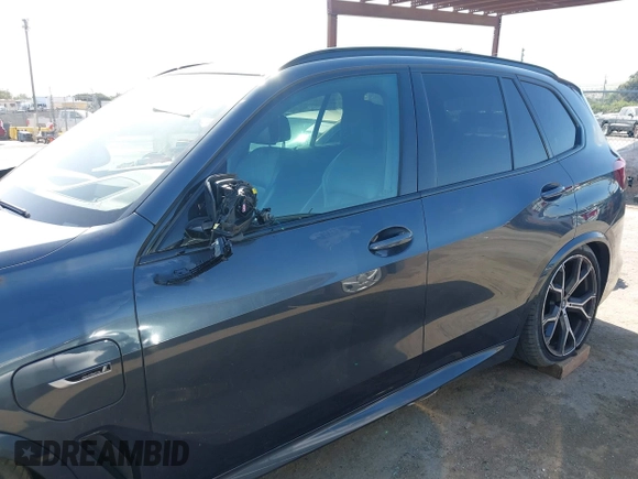 2022 BMW X5 xDrive45e with VIN 5UXTA6C07N9J29881, listed as a IAAI auction lot 42086373 with 63,510 mi miles and . Bid and sale history available at DreamBid. Image 14.