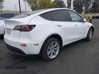2023 Tesla Model Y Long Range z VIN 7SAYGDEE5PA063097, wystawiony jako IAAI lot #42171871 z przebiegiem Nie podano mil oraz . Historia ofert i sprzedaży dostępna na DreamBid. Obrazek 4.