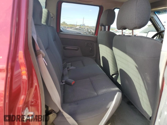 2003 Nissan Frontier XE with VIN 1N6ED27T13C409632, listed as a Copart auction lot 84884434 with 194,167 mi miles and Salvage title. Bid and sale history available at DreamBid. Image 10.