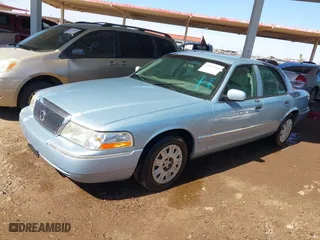 2004 Mercury Grand Marquis GS with VIN 2MEFM74W24X690149, listed as a IAAI auction lot 41842464 with 118,776 mi miles. Bid and sale history available at carsss.com. Image 2.